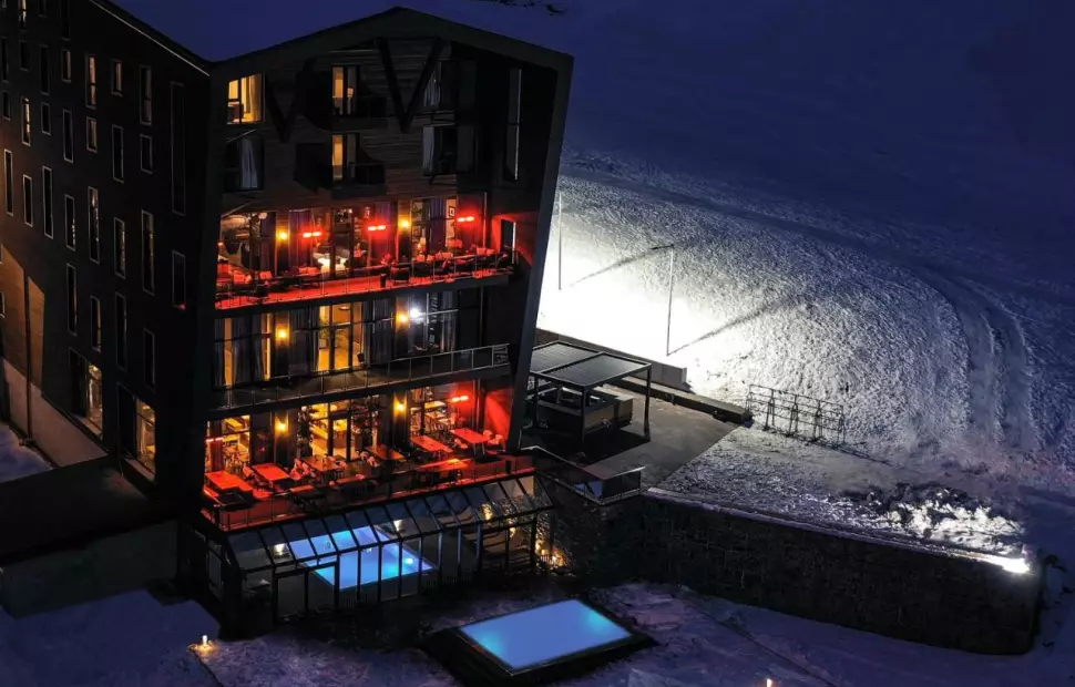 The Gudauri hotel building in winter, beside the ski slope